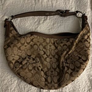Coach logo Hobo bag. Excellent condition. Could say it's vintage.